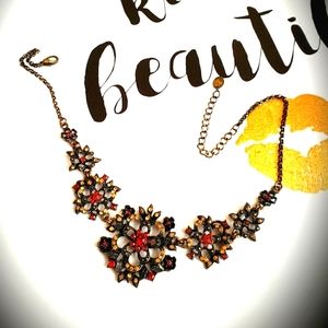 A beautiful bronze necklace with a classic and antique style